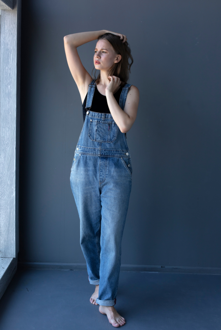 girl wear overalls